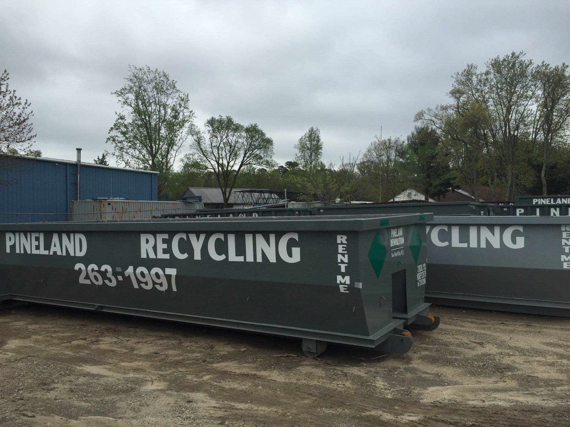 Dumpster being delivered