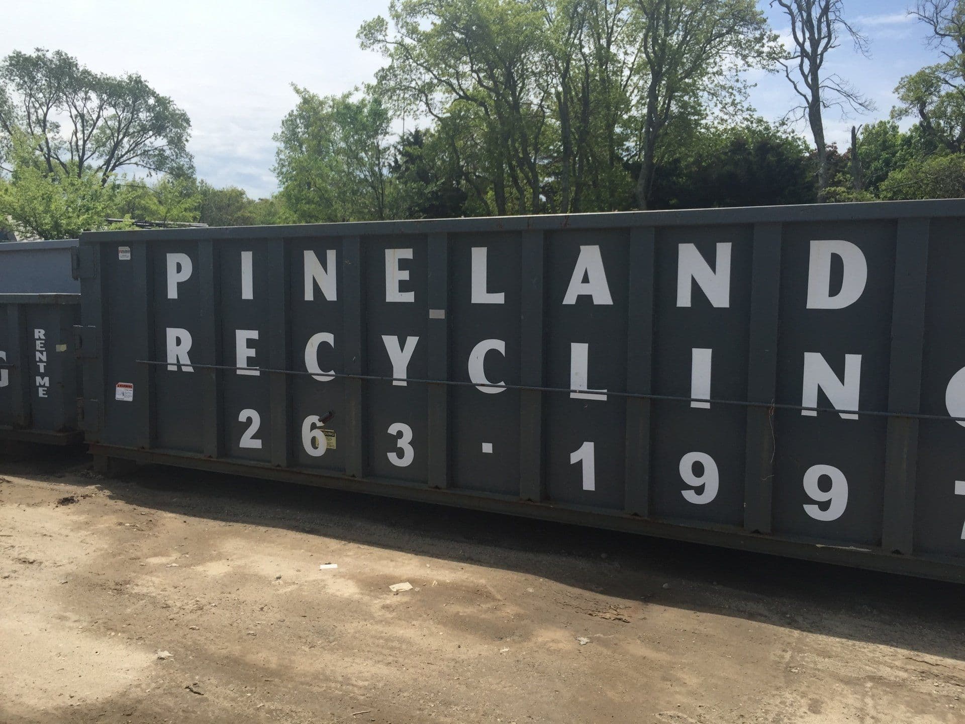 Roll-off dumpsters lined up